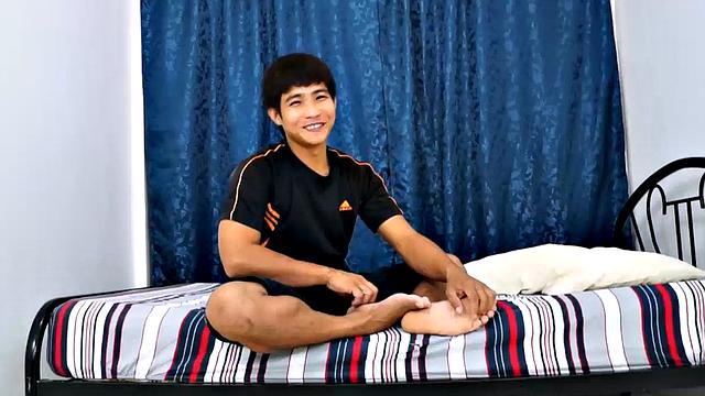 Jesse Rivera goes solo to show off his wide Asian boy feet. He's wearing white Nike's and watch him strip off and give a little self-tickle.