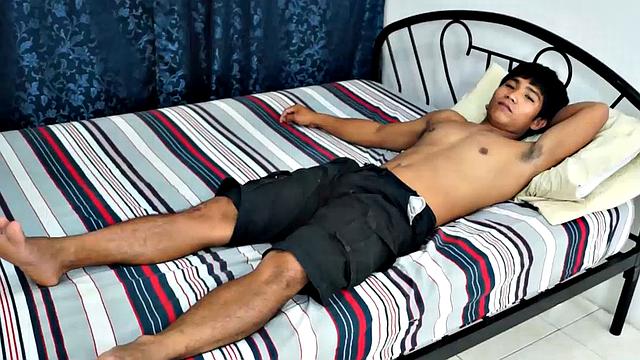 Jesse Rivera goes solo to show off his wide Asian boy feet. He's wearing white Nike's and watch him strip off and give a little self-tickle.