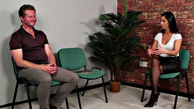 Curvy British voyeur in lingerie watching wanker