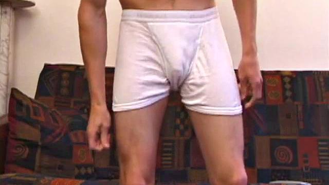 Stripped to boxer briefs, Chaz rubs vibrating dildo over growing bulge