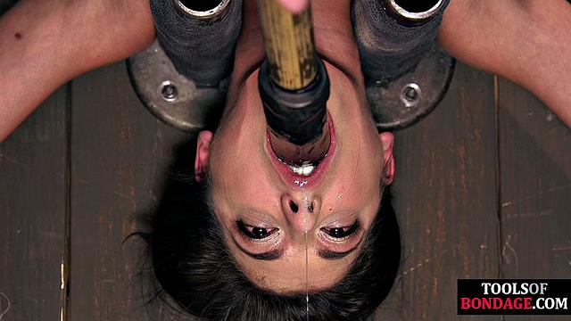 Sub suffers multiple orgasms in suspension bondage