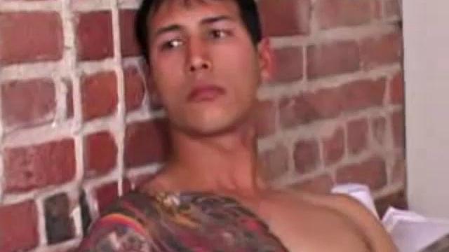 Young Eric Wynn goes into the bedroom to play with himself. Naked and hard, he strokes with determination. After a nice long stroke show, Eric launches a messy cum load onto his chest.