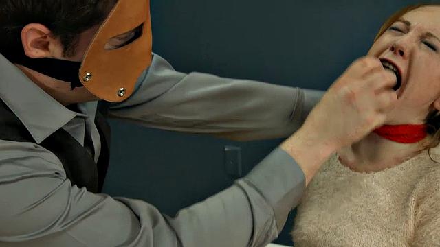 Rope-bound slut gagging on toy