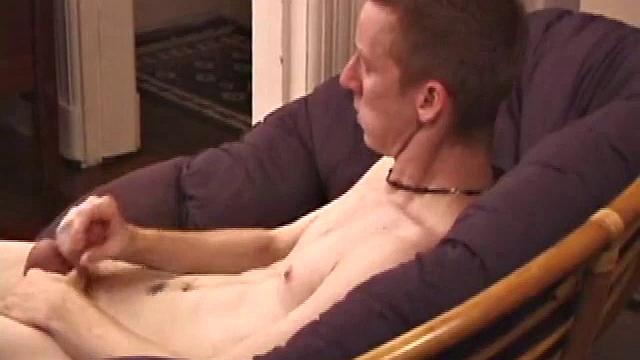 Jonathan Star plays with his cock, then gets naked. After lubing up he strokes his dick with determination, teasing his nipples. He edges himself closer and closer, before erupting.