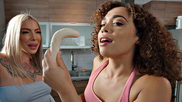 Big booty lesbians play in kitchen with banana