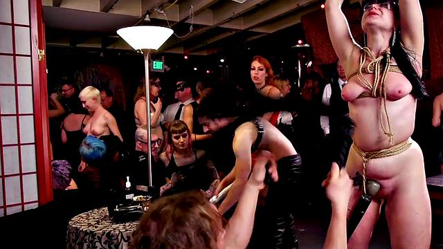 BDSM submissive lady whipped in public in front of voyeurs