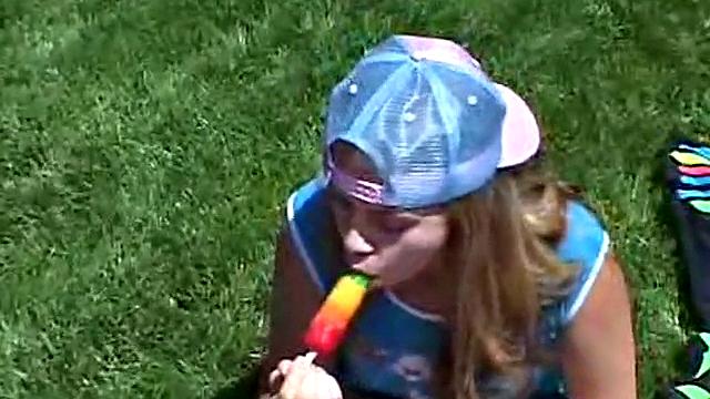 Little April Outdoors chugs a popsicle in her homemade video