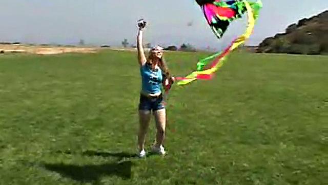Little April Outdoors chugs a popsicle in her homemade video