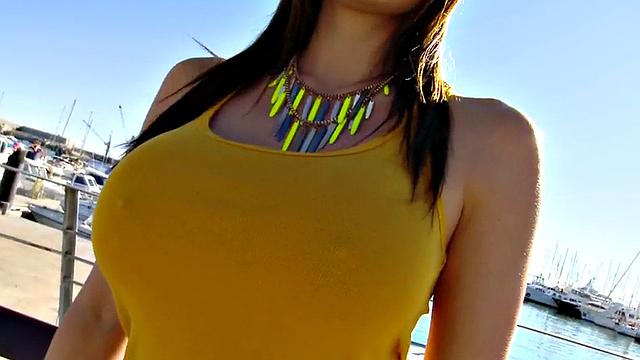 Big-titted slut deepthroating on beach