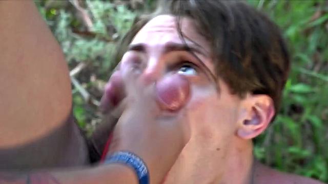 Young Latinos Cedric and Alan have found a secluded outdoor spot to have fun and they get things warmed up with some kissing under a big tree. It isn't long before both are naked and Alan is enjoying a big uncut cock.