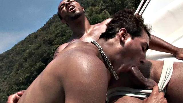 Alan and Bruno are out for an afternoon of boating in the hot Brazilian sun. They pull into a secluded cove and drop anchor. It's the perfect spot to strip out of swimwear and go down on each other's big uncut dicks.