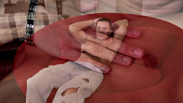 Smooth amateur stud enjoys tugging his hard on couch