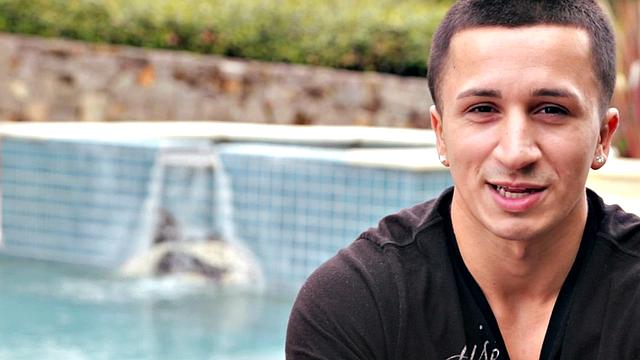 Smooth amateur stud enjoys tugging his hard on couch