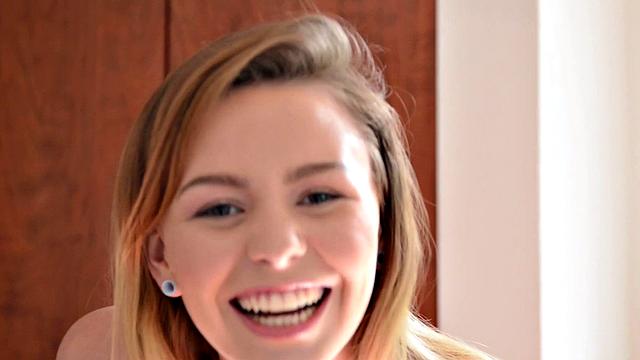 Gorgeous 18-year-old brunette soaps up her smooth slit in the shower, drops to her knees and fingers her wet cunt.