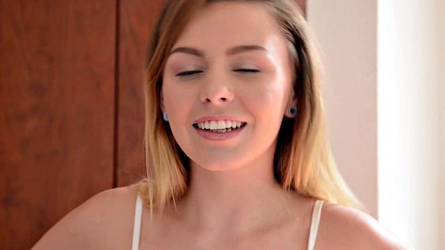 Gorgeous 18-year-old brunette soaps up her smooth slit in the shower, drops to her knees and fingers her wet cunt.