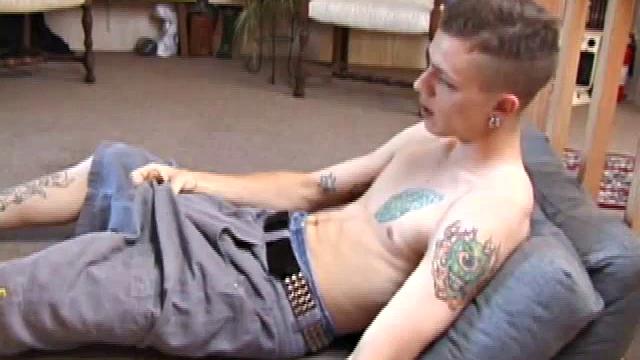 Rubbing his dick through his shorts you can tell this is a monster. Shane licks his fingers and rubs his nipples before the shorts flying off.