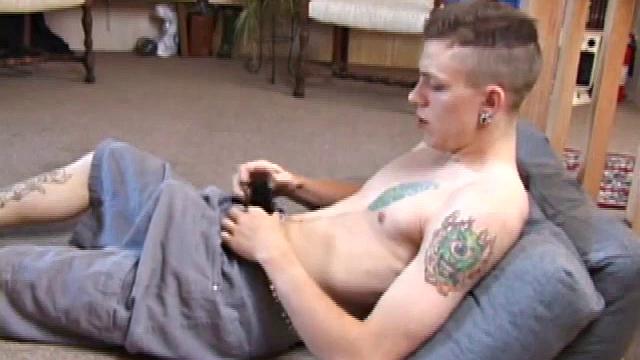 Rubbing his dick through his shorts you can tell this is a monster. Shane licks his fingers and rubs his nipples before the shorts flying off.