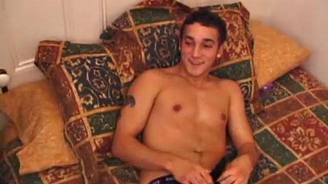 Horny gay stud strokes his cock hard, can't hold back the urge