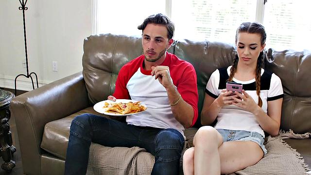 American babe gets her trimmed pussy drilled from behind while giving a handjob and getting a facial