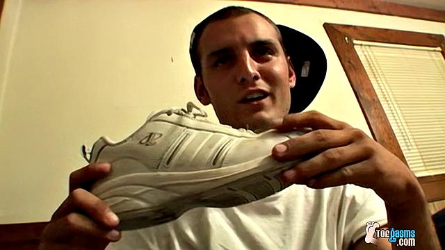 Watch Ajax stroke his cock and show off his foot fetish