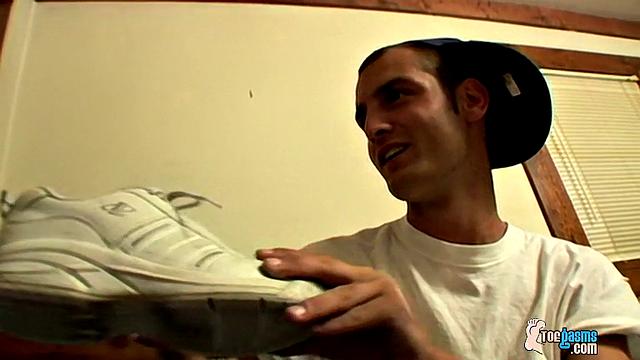 Watch Ajax stroke his cock and show off his foot fetish