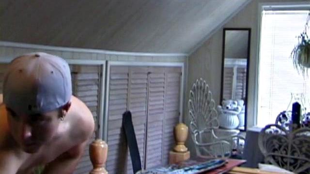 Alone with the camera, Cory Woodall stands mostly out of frame for a few minutes, which turns out to be kind of hot because you see just enough of his left arm and shoulder to know that e's working up his stiff one.