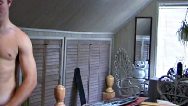 Alone with the camera, Cory Woodall stands mostly out of frame for a few minutes, which turns out to be kind of hot because you see just enough of his left arm and shoulder to know that e's working up his stiff one.