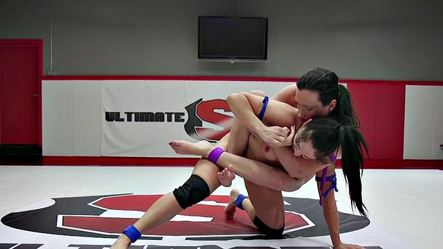 Lesbian amateur MILFS wrestle in wrestler match on mat