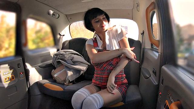 Alt babe rides taxi driver's cock after teasing him