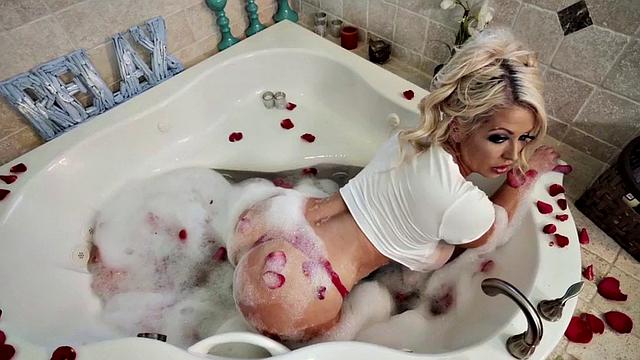 Big-titted MILF deepthroating in the bath