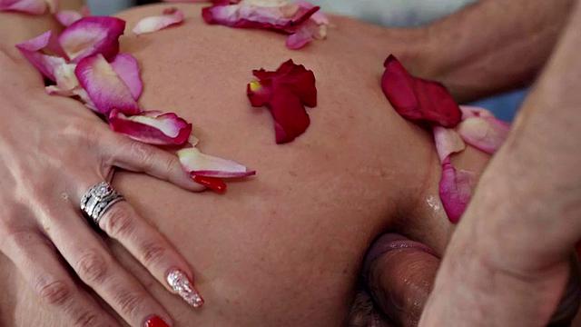 Big-titted MILF deepthroating in the bath