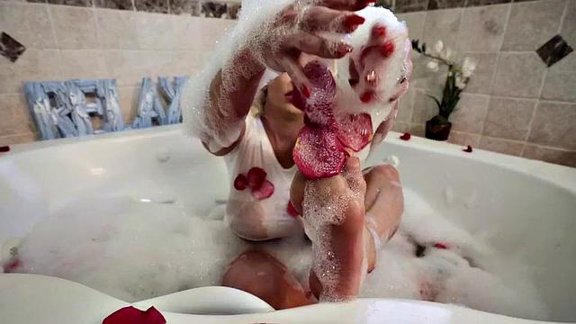 Big-titted MILF deepthroating in the bath