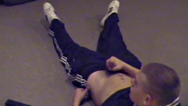 Lance pops in a porn video and pulls out his hard cock. He starts a long stroke show, getting himself close to cumming several times. Once past the point of no return, he pumps out a warm cum load onto his tummy.