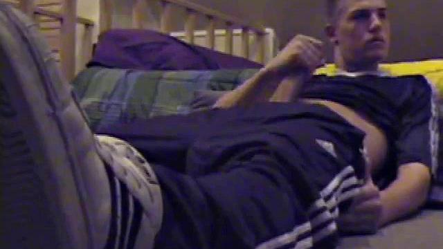 Lance pops in a porn video and pulls out his hard cock. He starts a long stroke show, getting himself close to cumming several times. Once past the point of no return, he pumps out a warm cum load onto his tummy.
