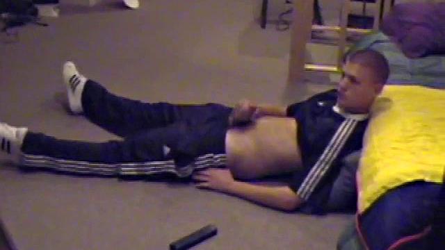 Lance pops in a porn video and pulls out his hard cock. He starts a long stroke show, getting himself close to cumming several times. Once past the point of no return, he pumps out a warm cum load onto his tummy.