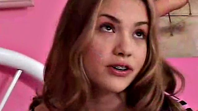 Petite blonde masturbates in bedroom