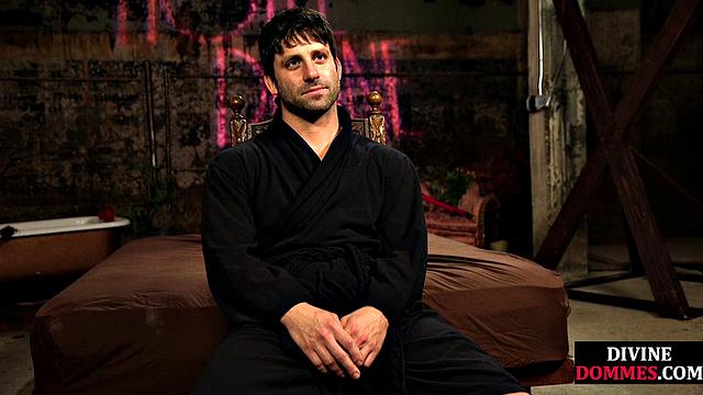 Busty latex femina dominates male using huge toy