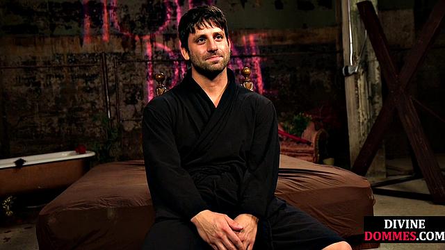 Busty latex femina dominates male using huge toy