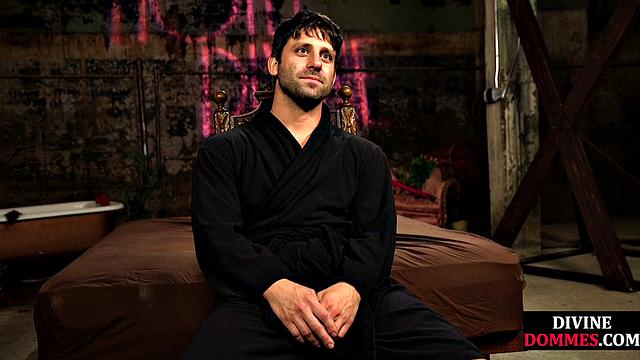 Busty latex femina dominates male using huge toy