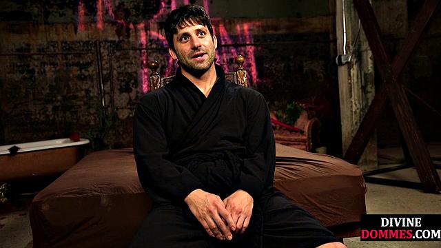 Busty latex femina dominates male using huge toy