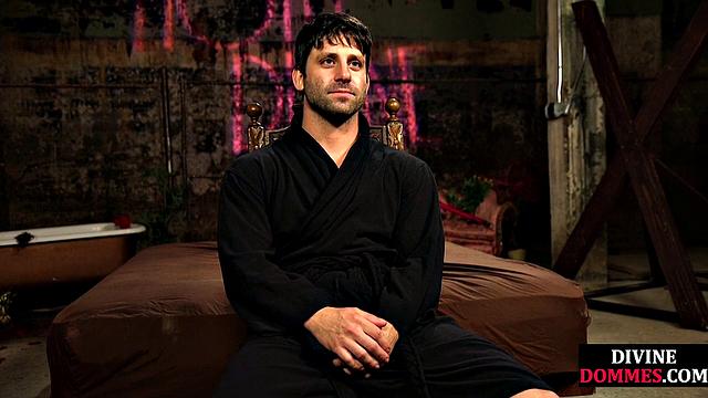 Busty latex femina dominates male using huge toy