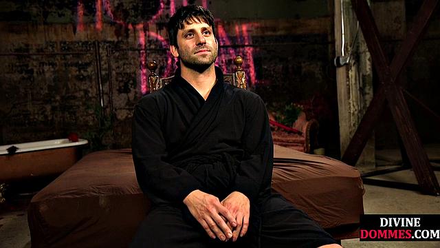 Busty latex femina dominates male using huge toy