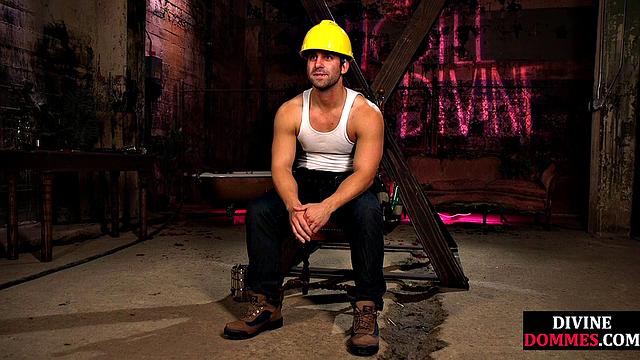 Busty latex femina dominates male using huge toy