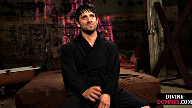 Busty latex femina dominates male using huge toy