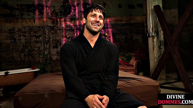 Busty latex femina dominates male using huge toy