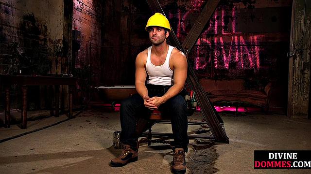 Busty latex femina dominates male using huge toy