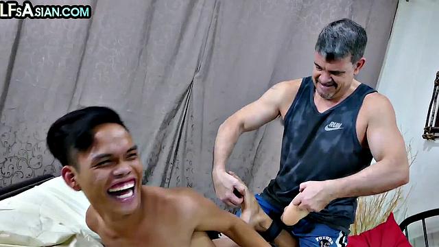 Asian twink barebacked by DILF after tickling