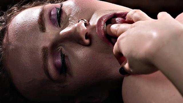 Inked babe masturbates with a vibrator and fuckmachine