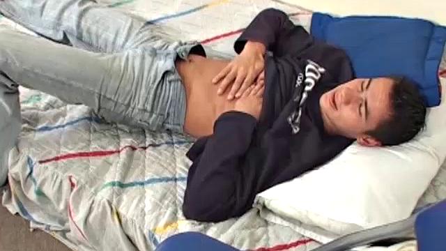 Esteve is a sexy young Latino with a big uncut cock swinging between his legs. On the bed, he strips naked and lets us watch as he works that monster to full size.