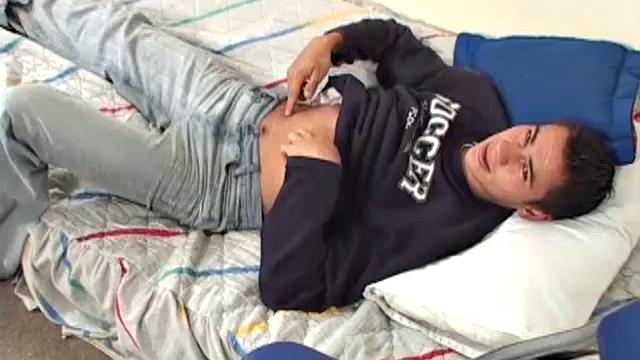 Esteve is a sexy young Latino with a big uncut cock swinging between his legs. On the bed, he strips naked and lets us watch as he works that monster to full size.